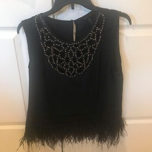 BCBG black shirt with feathers and beads size medium